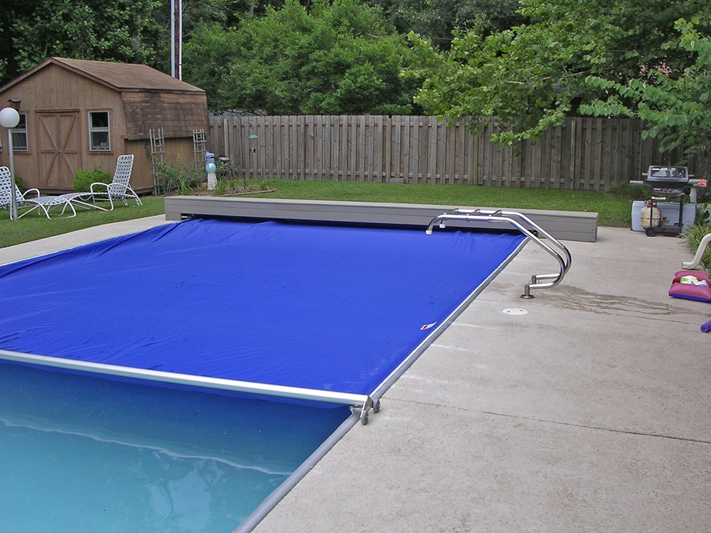 Manual or Auto Pool Covers; Which is Better? - Latham Pool
