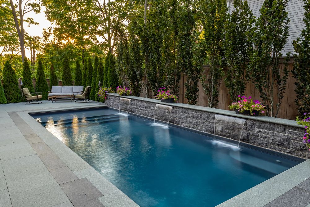 vinyl liner pool with custom water features in Ontario backyard