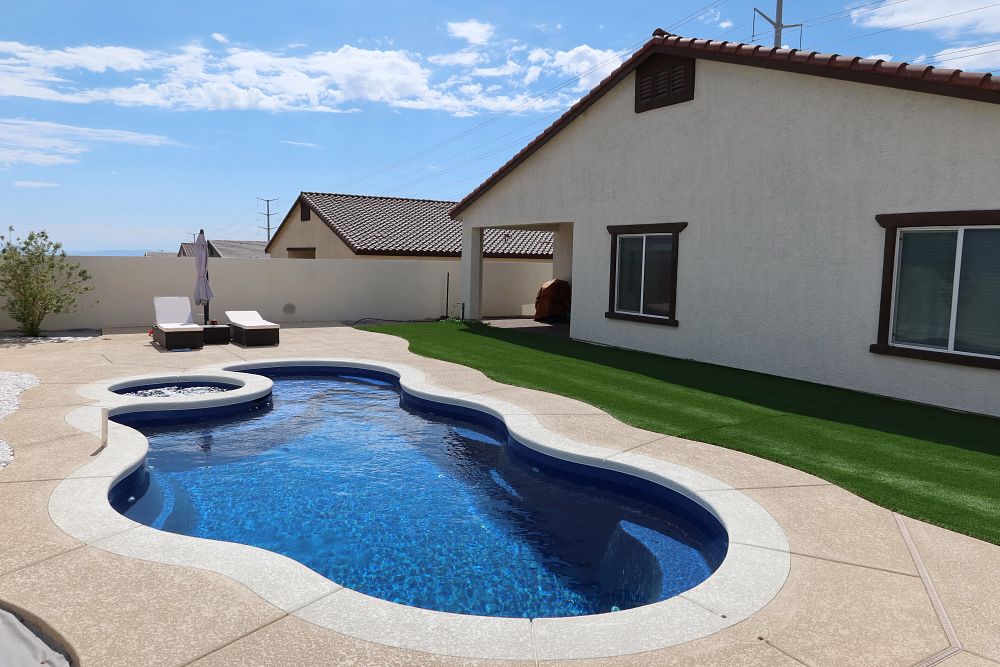 custom fiberglass pool and spa in a suburban Nevada backyard