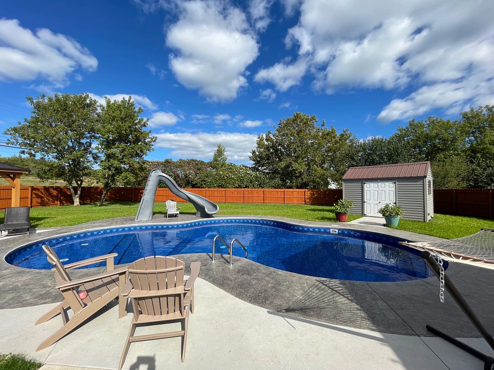 pool slide leading into vinyl liner pool